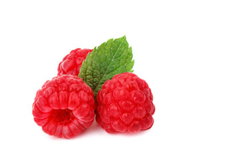 Tasty ripe raspberries on a white background.
