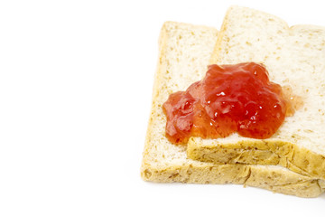 slice of bread with strawberry jam isolated