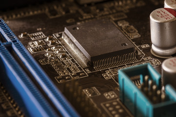 Application Specific Integrated Circuits and Chip Capacitors mounted on a printed wiring board