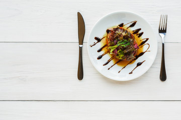 Grilled vegetables salad on white wood