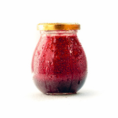 mock-up Magic jam in jar strawberries and sugar isolated on white