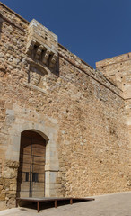 Fototapeta na wymiar Door in the castle wall of Requena
