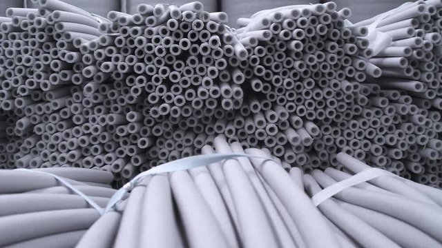 Manufacture of heat-insulating material for pipes, view of tubes, ready heat-insulating material for pipes.
