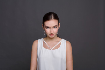 Portrait of serious woman looking straight