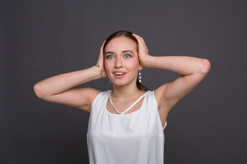Fototapeta premium Shocked happy woman with touching her head