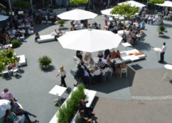 People in cafe with a blurred background.