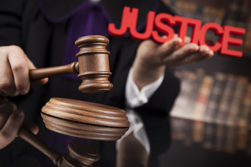 Justice and law concept. Male judge in a courtroom