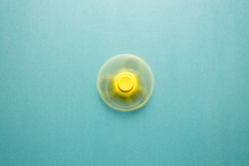 Yellow fidget spinner rotates