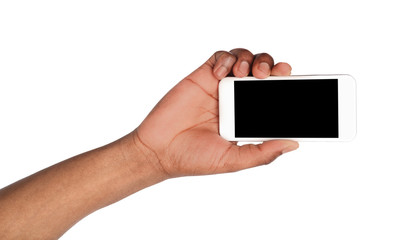 Hand holding mobile smart phone with blank screen