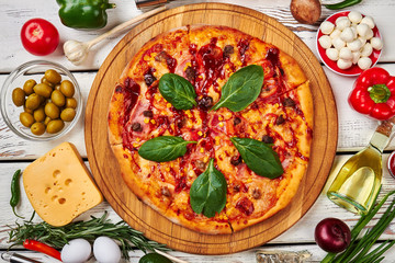 Tasty pizza with salami.