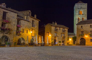 Obraz premium Ainsa medieval village of the Pyrenees with beautiful stone houses at night, Huesca, Spain
