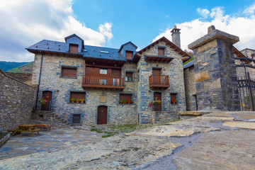 Fototapeta na wymiar Houses of high mountain villages in the pyrenees of huesca, spain
