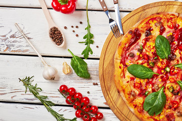 Colorful composition of delicious pizza.
