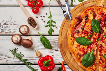 Composition from pizza and ingredients.