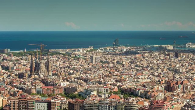 wide angle timelapse of barcelona shot from the bunkers de carmel offering amazing panoramic views over the city skyline