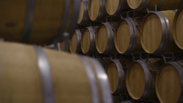 Wine barrels in wine cellar