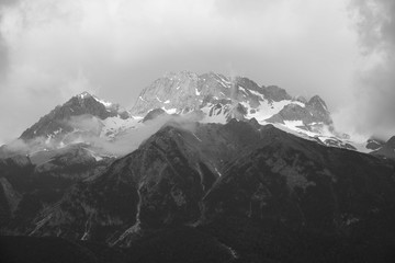 view of jade dragon snow mountain with cloudy in lijiang ,China