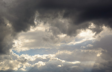 Beautiful heavenly landscape with the sun in the clouds.
