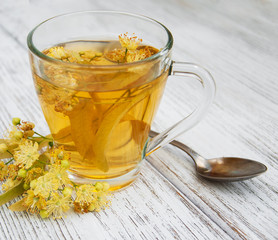 cup of herbal tea with linden flowers