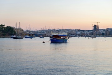 Fototapeta premium Ship moored in St. Elmo bay, Valetta, Malta.