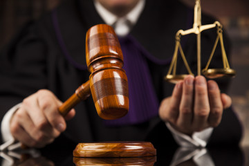 Justice and law concept. Male judge in a courtroom