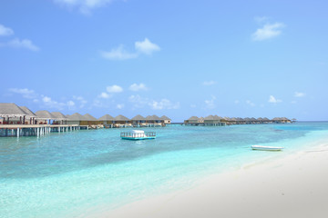 Fototapeta na wymiar Sunny day in sea bungalow at Maldive