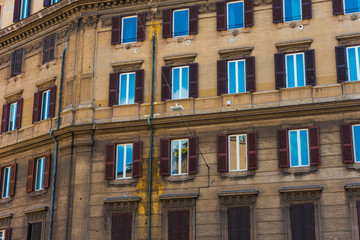 Fototapeta na wymiar brown house facade with some windows