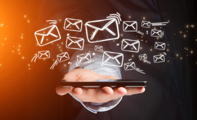 View of a Concept of sending message with email icon around - Communication and technology concept