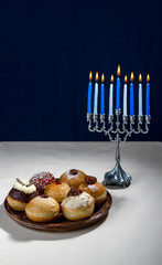 Jewish holiday of Hanukkah, hanukkah menorah and sufganiyot