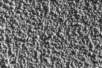 Surface of the decorative coating of the concrete wall of the building.