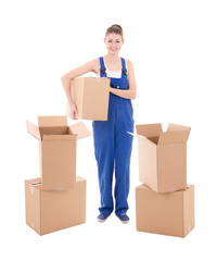 moving day concept - young attractive woman in workwear with cardboard boxes isolated on white