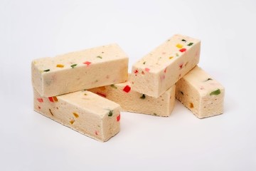 Several pieces of apple marshmallow sticks with marmalade