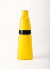 Plastic bottle of glue on white background, close-up 