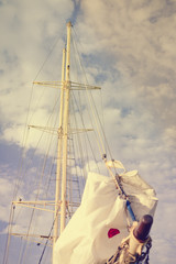 Travel vacation background. Sailing yacht mast, ropes, ocean sunny outdoors