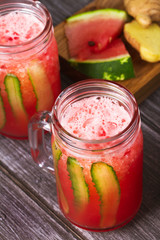 Watermelon, cucumber and ginger cocktail in jars