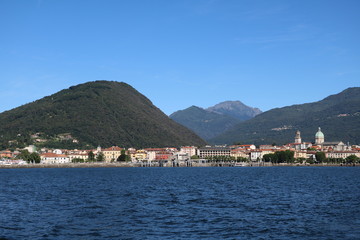 Holidays at Lake Maggiore in summer, view to Intra Verbania from the car ferry, Italy