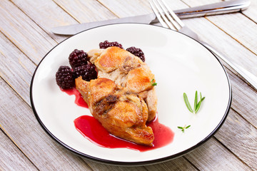 Rabbit in blackberry sauce with rosemary and thyme