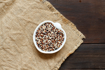 Pile of uncooked mixed quinoa