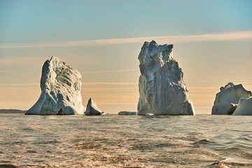 iceberg floating in greenland fjord © the_lightwriter