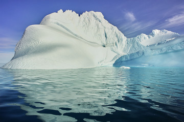 iceberg floating in greenland fjord