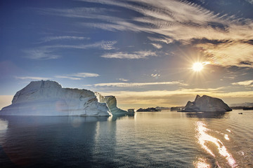 Fototapeta na wymiar iceberg floating in greenland fjord