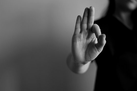 Young woman's hands shows ok. Gesture
