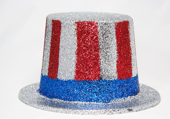 Glittery red, white and blue Uncle Sam hat. Isolated.