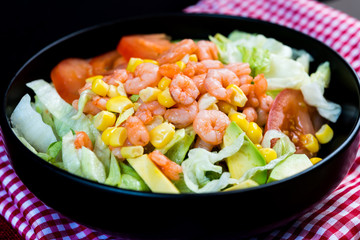 Delicious fresh salad and olive oil
