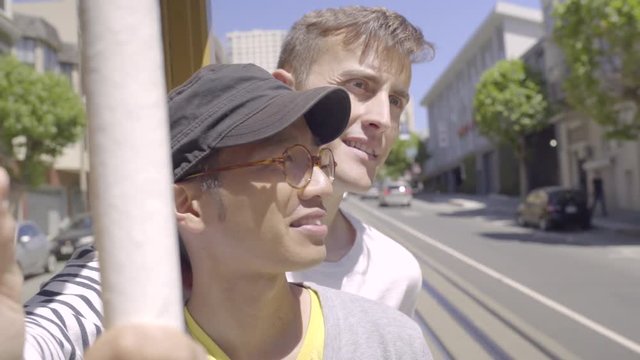 Gay Couple Ride A Trolley Through San Francisco, They Come To A Stop And Take A Selfie Together 