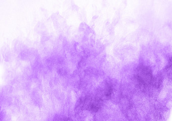 Fototapeta premium Freeze motion of colored powder explosion isolated on white background.