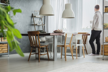 Dining room with concrete wall
