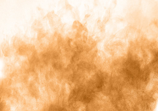 Freeze motion of colored powder explosion isolated on white background.