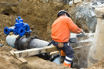 sewer  pipes repair for worker in  in construction site - obrazy, fototapety, plakaty