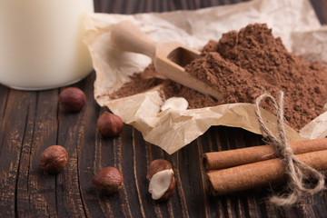 Chocolate heart-shaped candy on a rustic background, chocolate composition